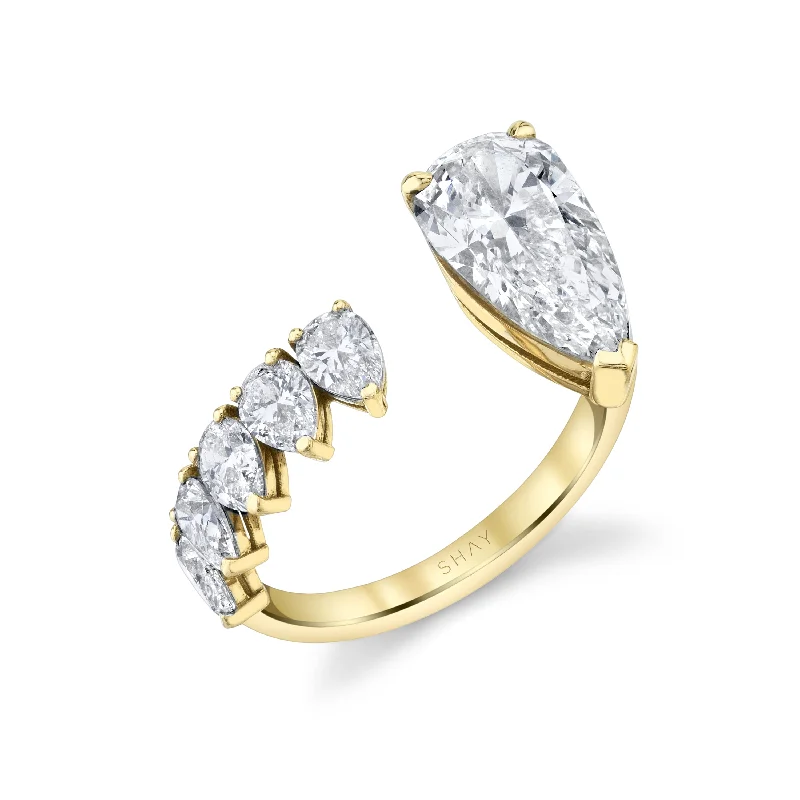 women anniversary rings -DIAMOND FLOATING ELONGATED PEAR RING